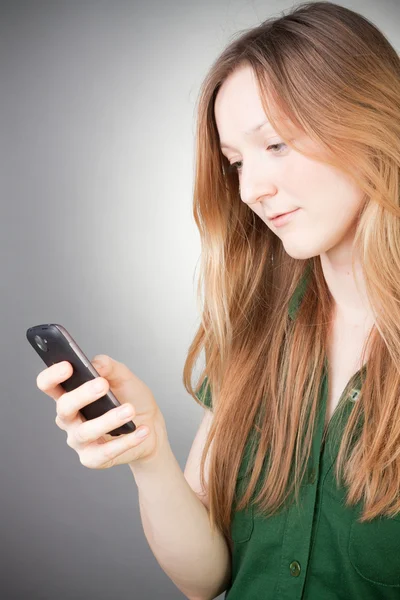 stock image Image of Beautiful Woman Using her Mobile, with grey background