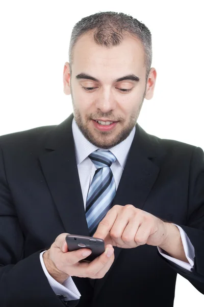Liikemies käyttää matkapuhelintaan. — kuvapankkivalokuva