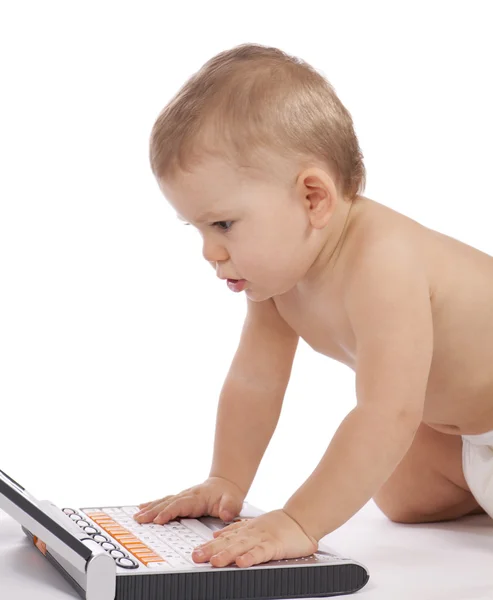 stock image Little baby with computer