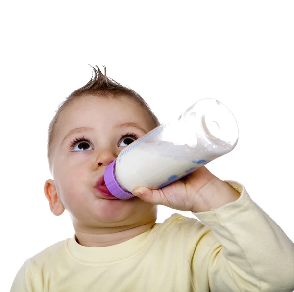 Bebê Está Bebendo Leite Uma Mamadeira Sozinha — Fotografia de Stock