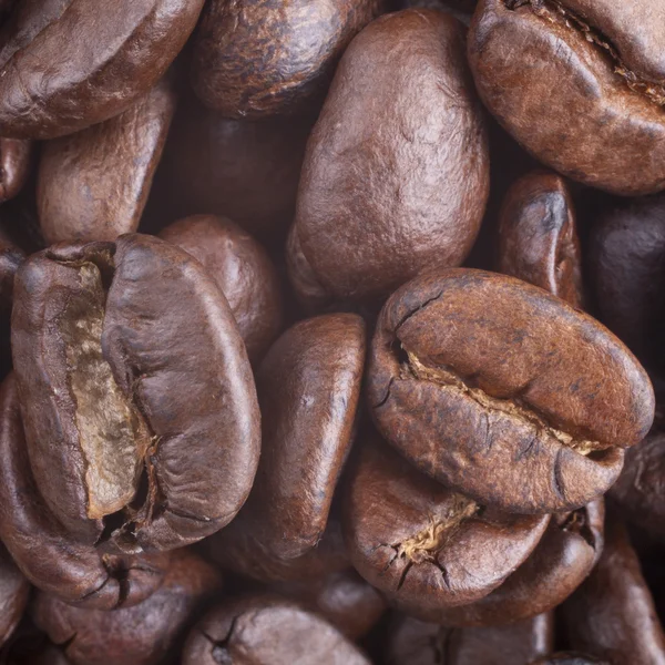 Kahve Taneleri Bir Arka Plan Için Yakın Çekim — Stok fotoğraf