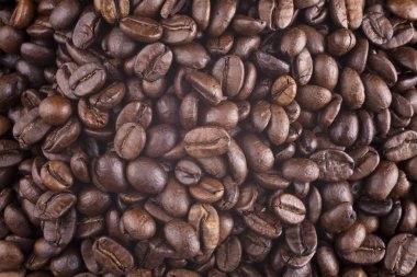 Coffee grains for a background close up clipart