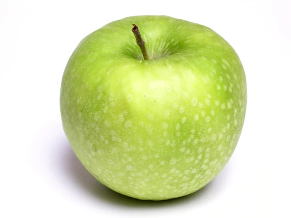 stock image Close up of a green apple on a white background