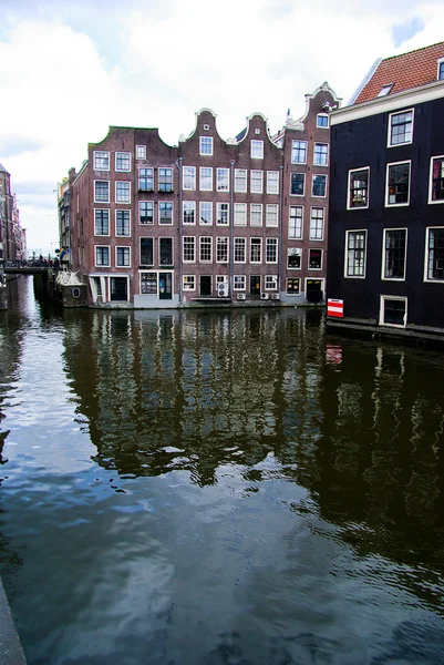 stock image Water canal with houses in Amsterdam, Holland