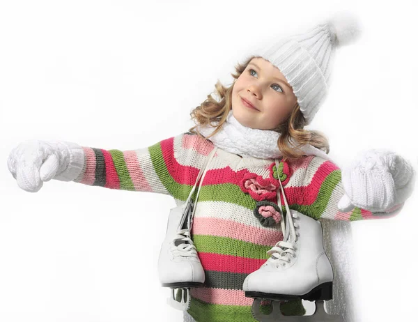 Girl in winter clothes with figure skates — Stock Photo, Image