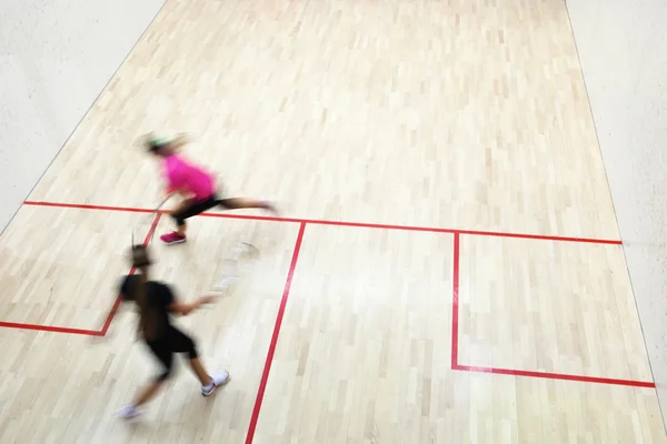 Dvě Ženské Squashové Hráče Rychlou Akci Squashovém Kurtu Pohybu Rozmazaný — Stock fotografie