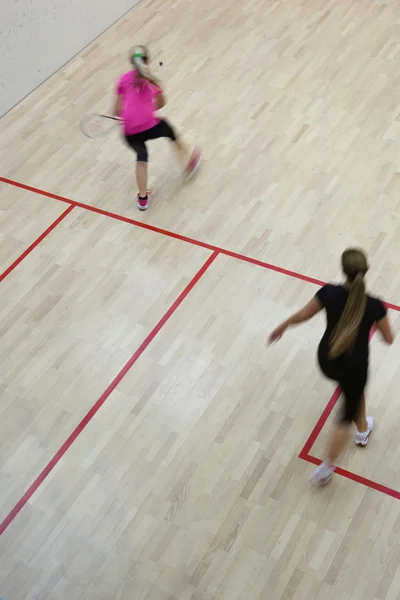Two Female Squash Players Fast Action Squash Court Motion Blurred — Stock Photo, Image