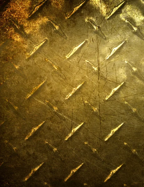 Roestige metalen plaat in gouden tinten — Stockfoto