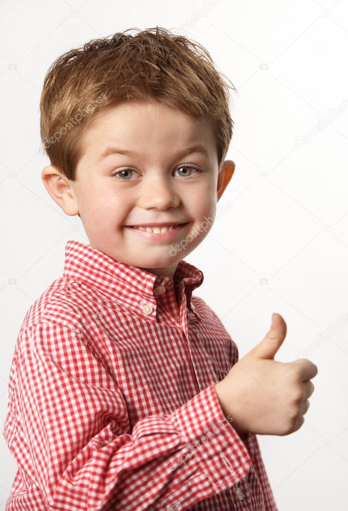 Young boy with thumb up