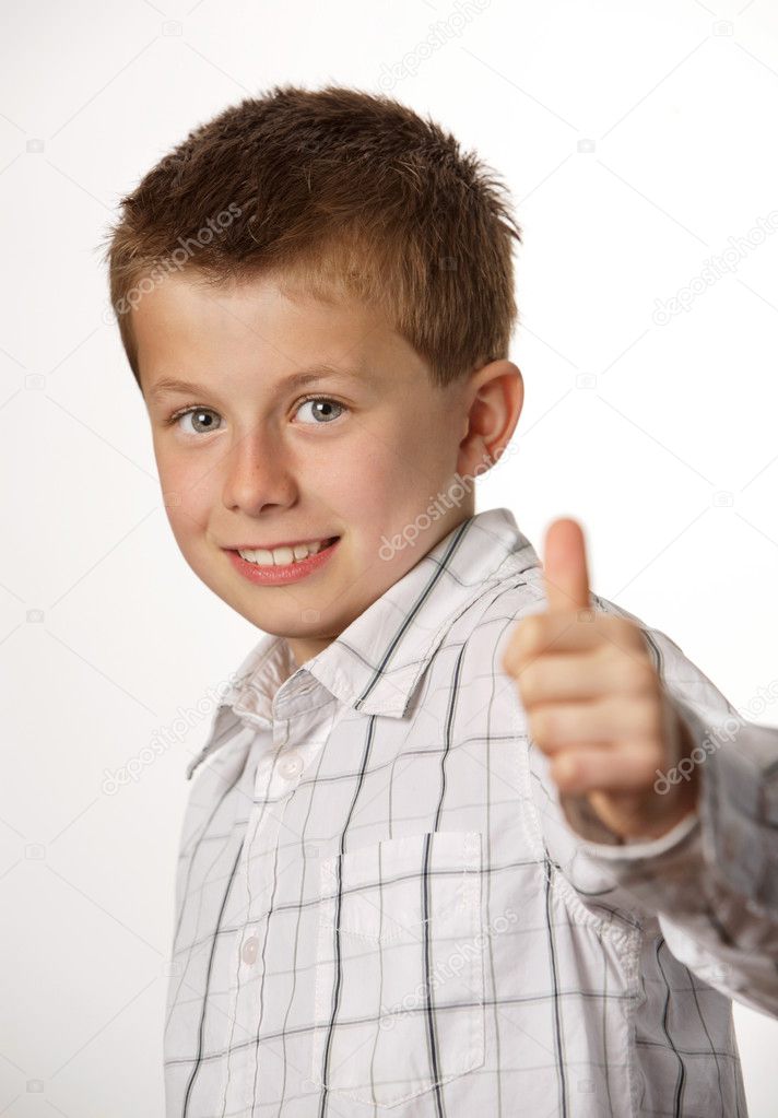 Young boy with thumb up