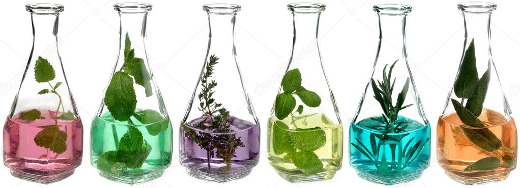 Herbs in glass bottles