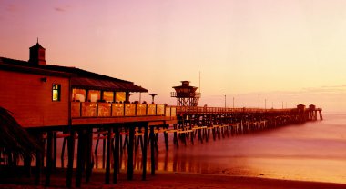 Pier at sunset clipart