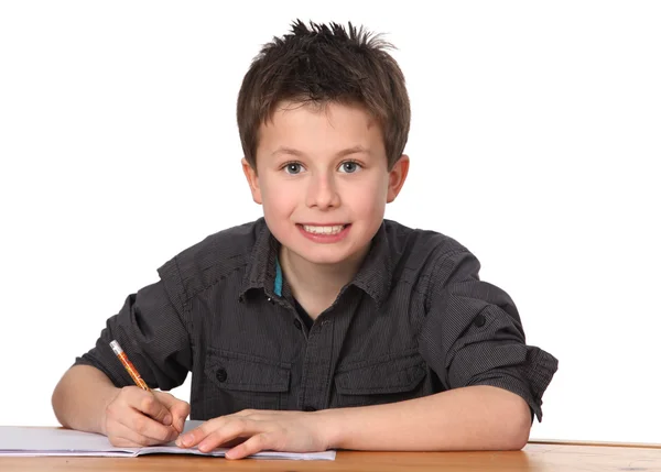 Roztomilý Mladý Chlapec Dělat Domácí Úkoly — Stock fotografie