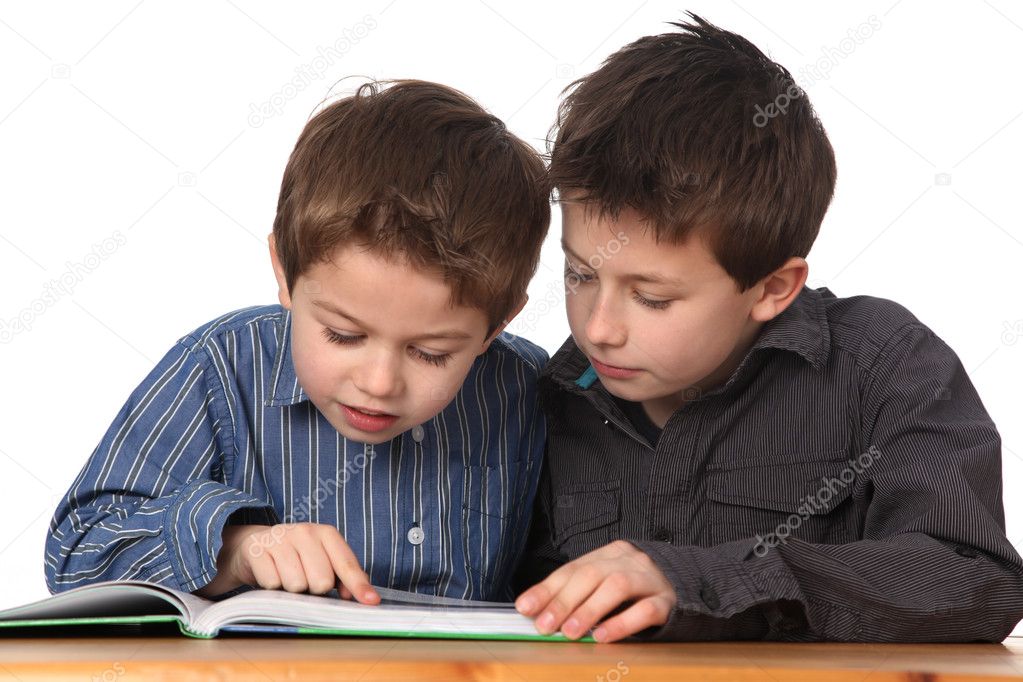 Two young boys learning