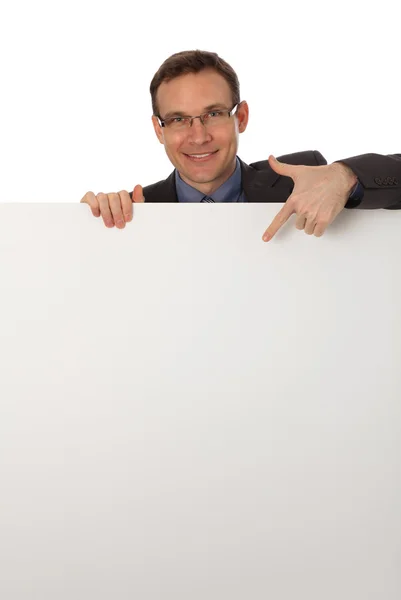 Businessman holding a blank sign — Stock Photo, Image
