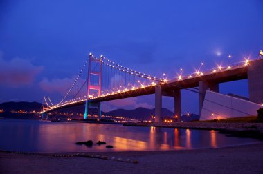 Tsing Ma Bridge in Hong Kong at night clipart
