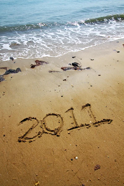 2011 pisze na piasku — Zdjęcie stockowe