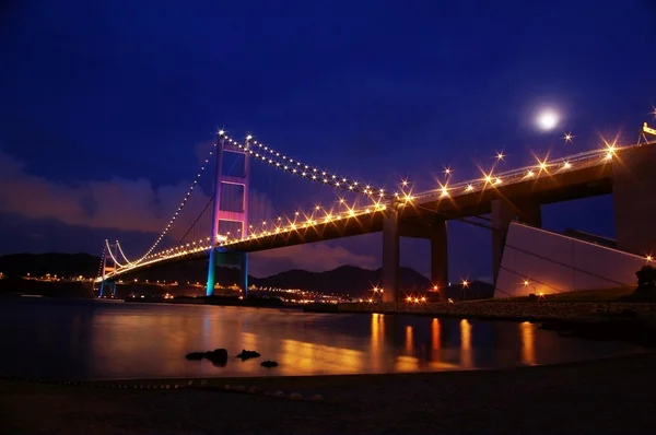 Мост Цин Ма в Гонконге ночью — стоковое фото