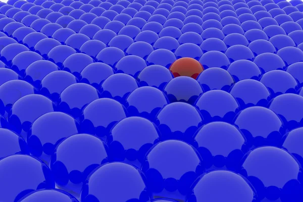 Een heleboel blauwe ballen en een rood. — Stockfoto