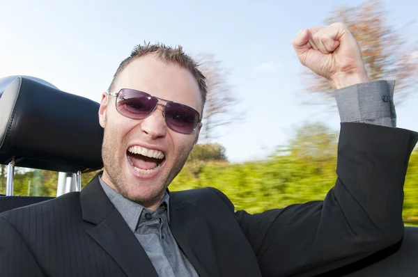 Man and his sports car — Stock Photo, Image