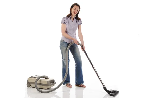 Hausfrau mit Staubsauger — Stockfoto