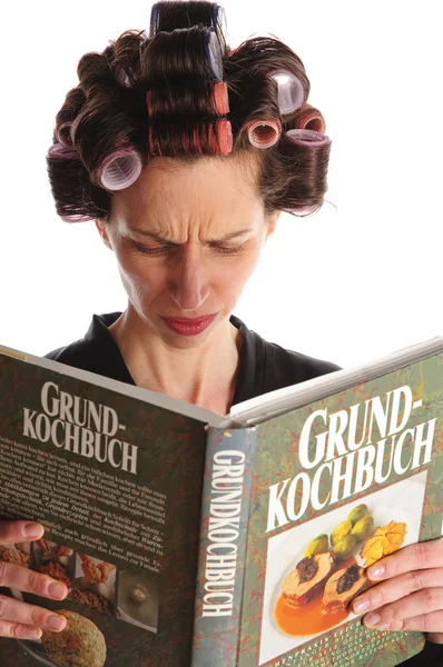 Housewife with cookbook — Stock Photo, Image
