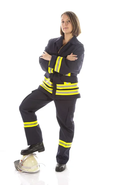 Junge Feuerwehrfrau in uniforme — Foto Stock