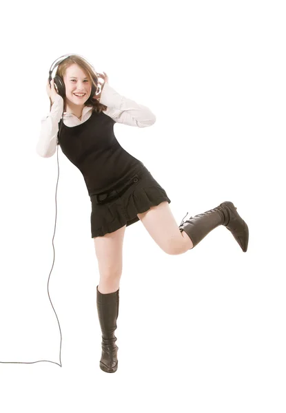 Una linda chica escuchando música — Foto de Stock