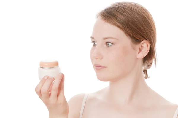 Cute girl with lotion — Stock Photo, Image