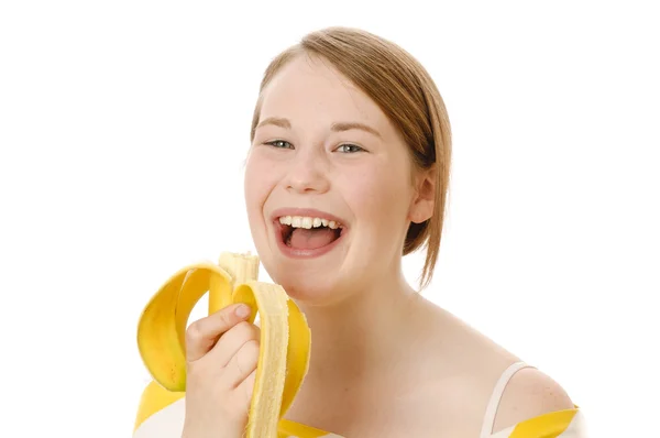Linda chica comiendo fruta fresca —  Fotos de Stock