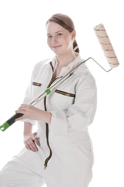 Female artisan with paint roller — Stock Photo, Image