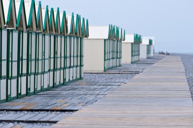 Row of beach huts clipart