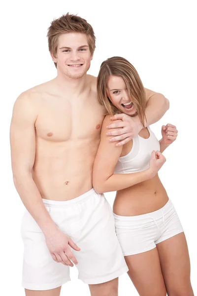 フィットネス 若い陽気な笑みを浮かべてカップルが白い背景の上の訓練の後楽しんで — ストック写真