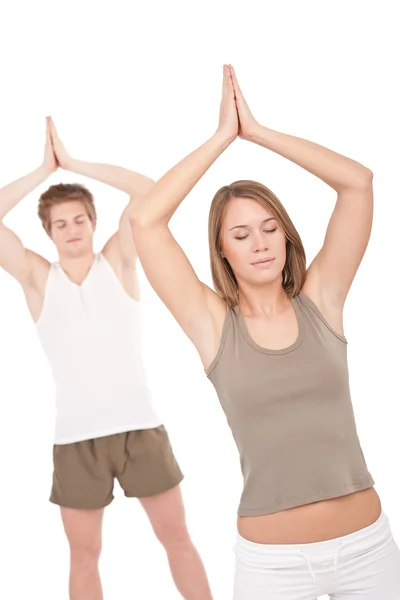 Fitness - Pareja joven y saludable en posición de yoga —  Fotos de Stock