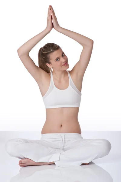 Fitness - Young woman in yoga position — Stock Photo, Image