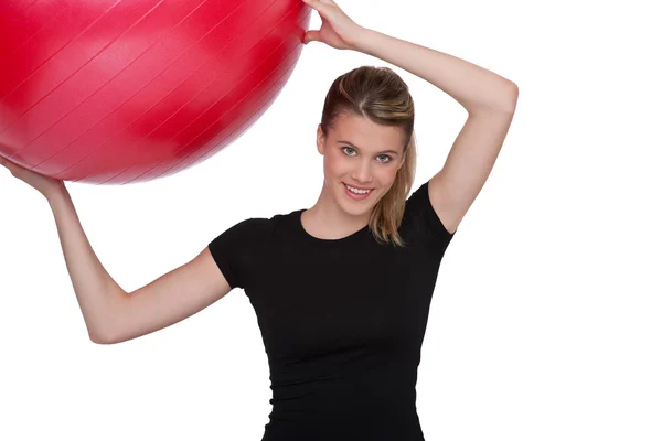 Fitness - Young woman with exercise ball on white — Stock Photo, Image