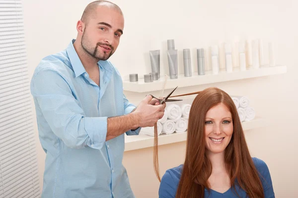 Professional hairdresser cut with scissors at salon — Stock Photo, Image