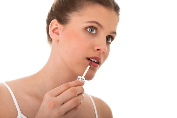Frau Trägt Lippenstift Auf Weißem Hintergrund Auf — Stockfoto
