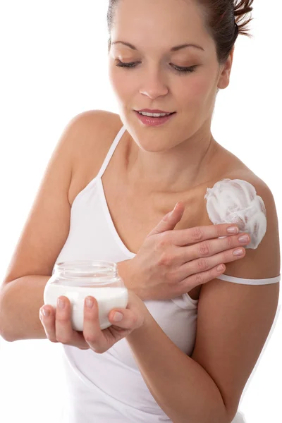 Serie per la cura del corpo - donna che applica la crema — Foto Stock