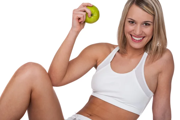 Σειρά Fitness - χαμογελώντας γυναίκα με πράσινο μήλο — Φωτογραφία Αρχείου