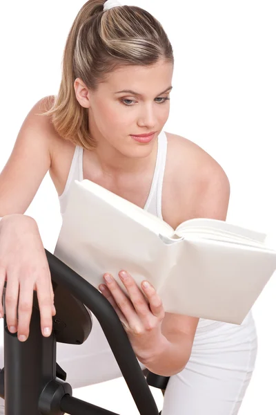 Fitness Series Woman Reading Book Cycling Exercise Bike — Stock Photo, Image