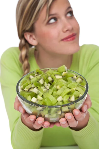 Healthy lifestyle series - Woman holding bowl with kiwi — Stock Photo, Image