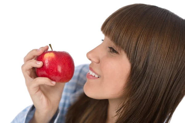 Adolescente feliz comiendo manzana saludable para el desayuno — Foto de Stock