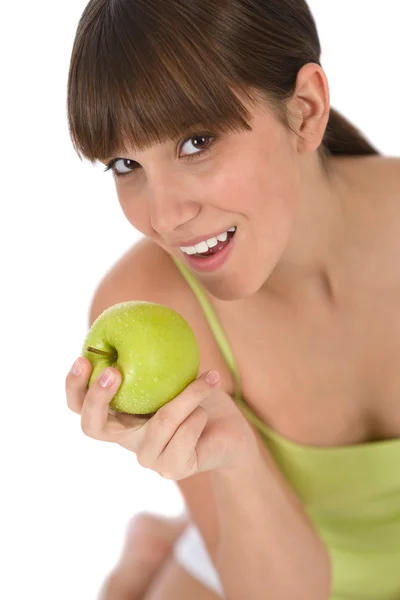 Счастливая девочка-подросток со здоровым яблоком — стоковое фото