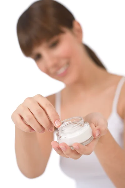 Body care - Female teenager applying moisturizer — Stock Photo, Image
