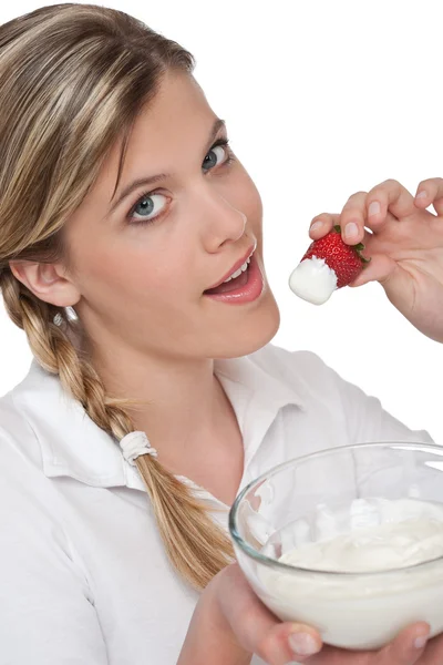 Healthy lifestyle series - Woman eating strawberry and yogurt — Stok fotoğraf
