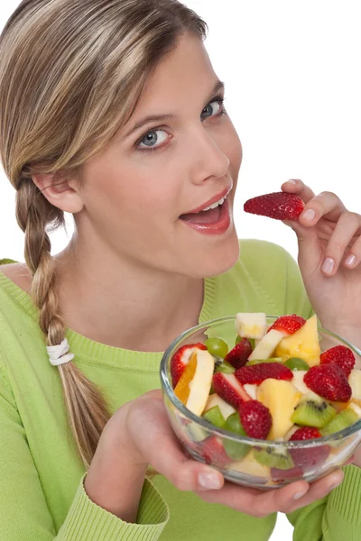 Sağlıklı bir yaşam tarzı serisi - meyve yiyen kadın — Stok fotoğraf
