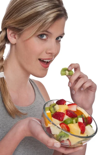 Sağlıklı bir yaşam tarzı serisi - kadın meyve salatası ile — Stok fotoğraf