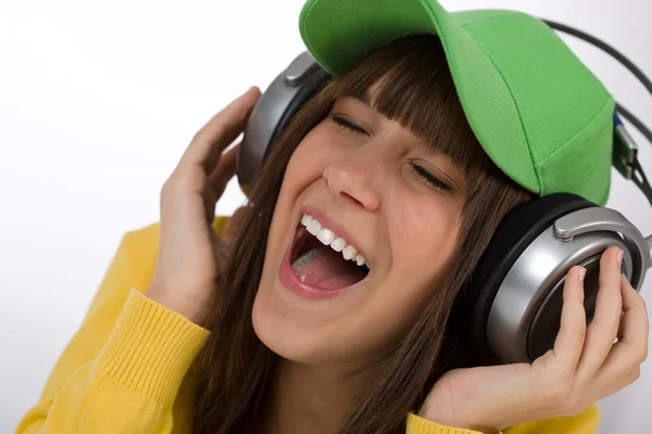Happy Female Teenager Enjoy Music White Background Headphones Baseball Cap — Stock Photo, Image