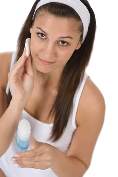 Beauty facial care - Teenager woman cleaning acne skin — Stock Photo, Image